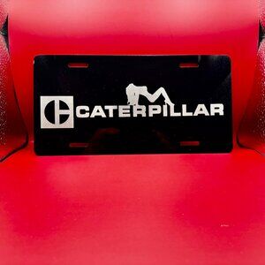 Caterpillar License plate with CAT girl on Top